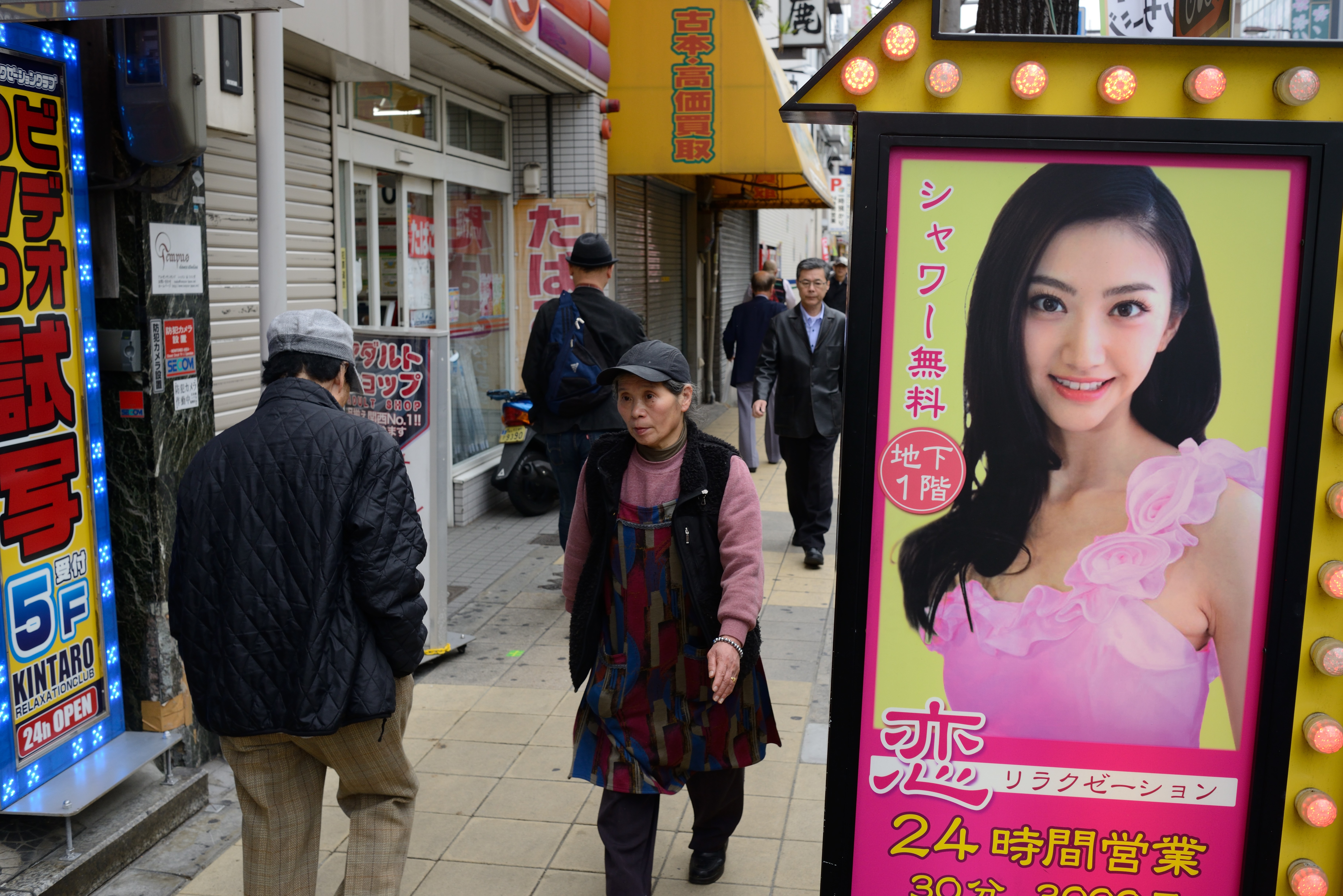 JAPAN, OSAKA - MARCH 28 : The city of Osaka. Fashion street in the shopping area of Osaka on March 28, 2015 in Osaka, Japan. (Photo by FrÃ©dÃ©ric Soltan/Corbis via Getty Images)