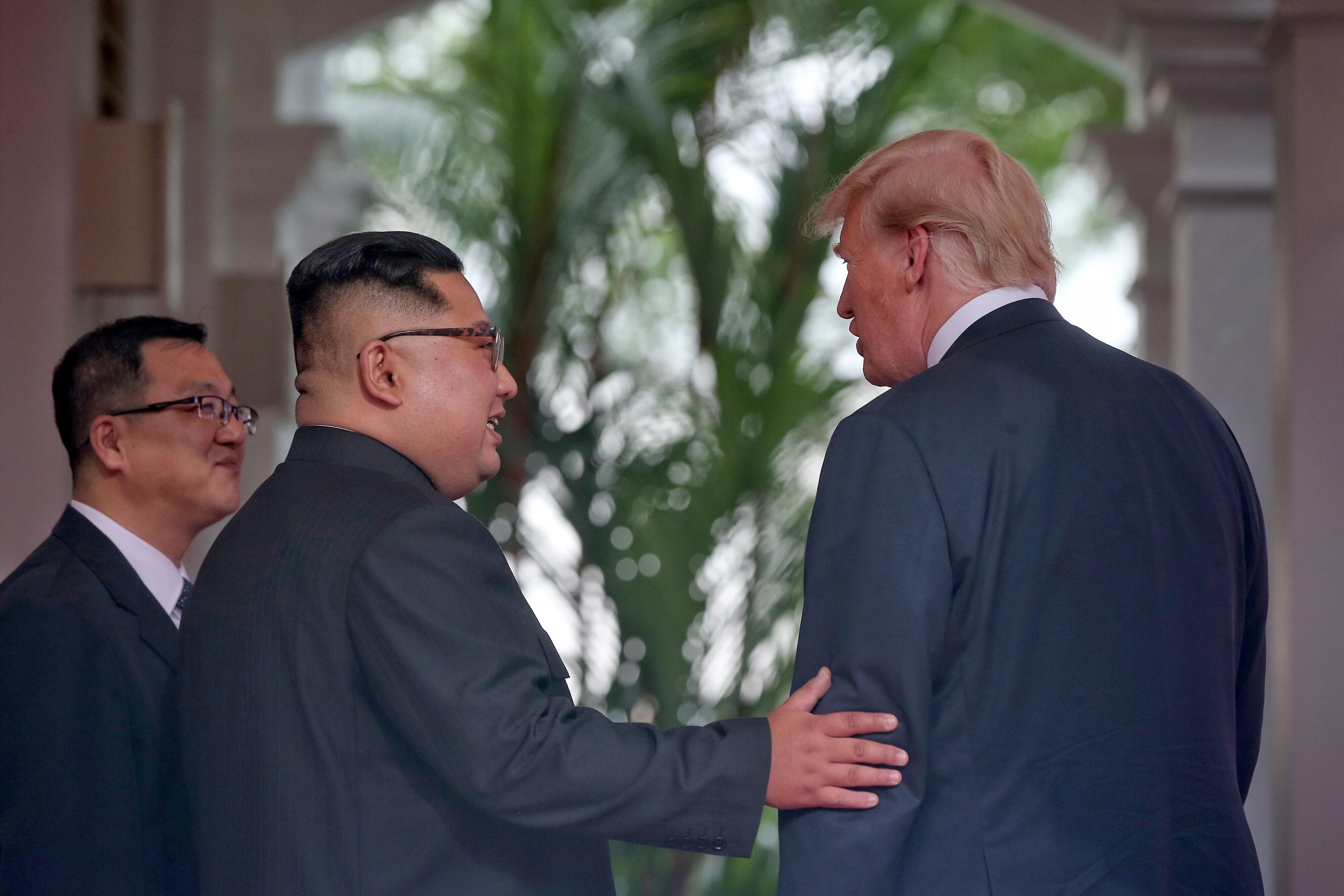 US President Donald Trump (right) meets North Korean leader Kim Jong-un at Sentosa Island in Singapore in June 2018. Photo: dpa