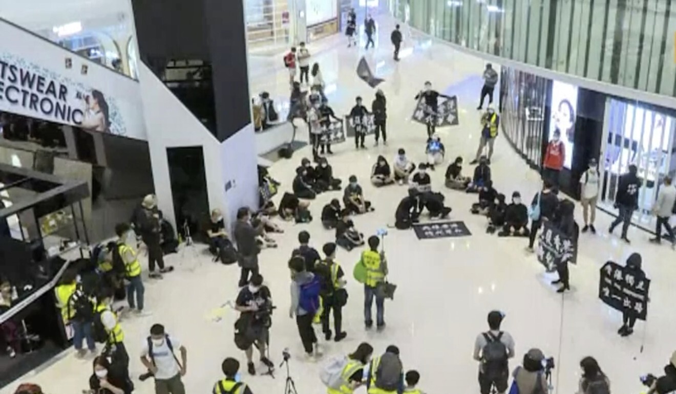 Protesters held a sit-in in Yoho Mall in Yuen Long. Photo: Now TV