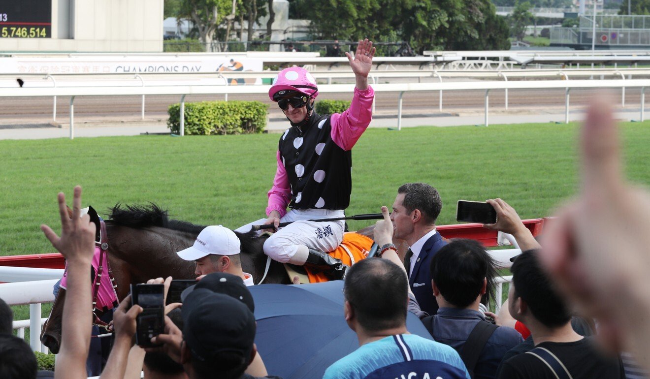 Zac Purton waves to the fans after Beauty Generation’s win in the 2019 Champions Mile.