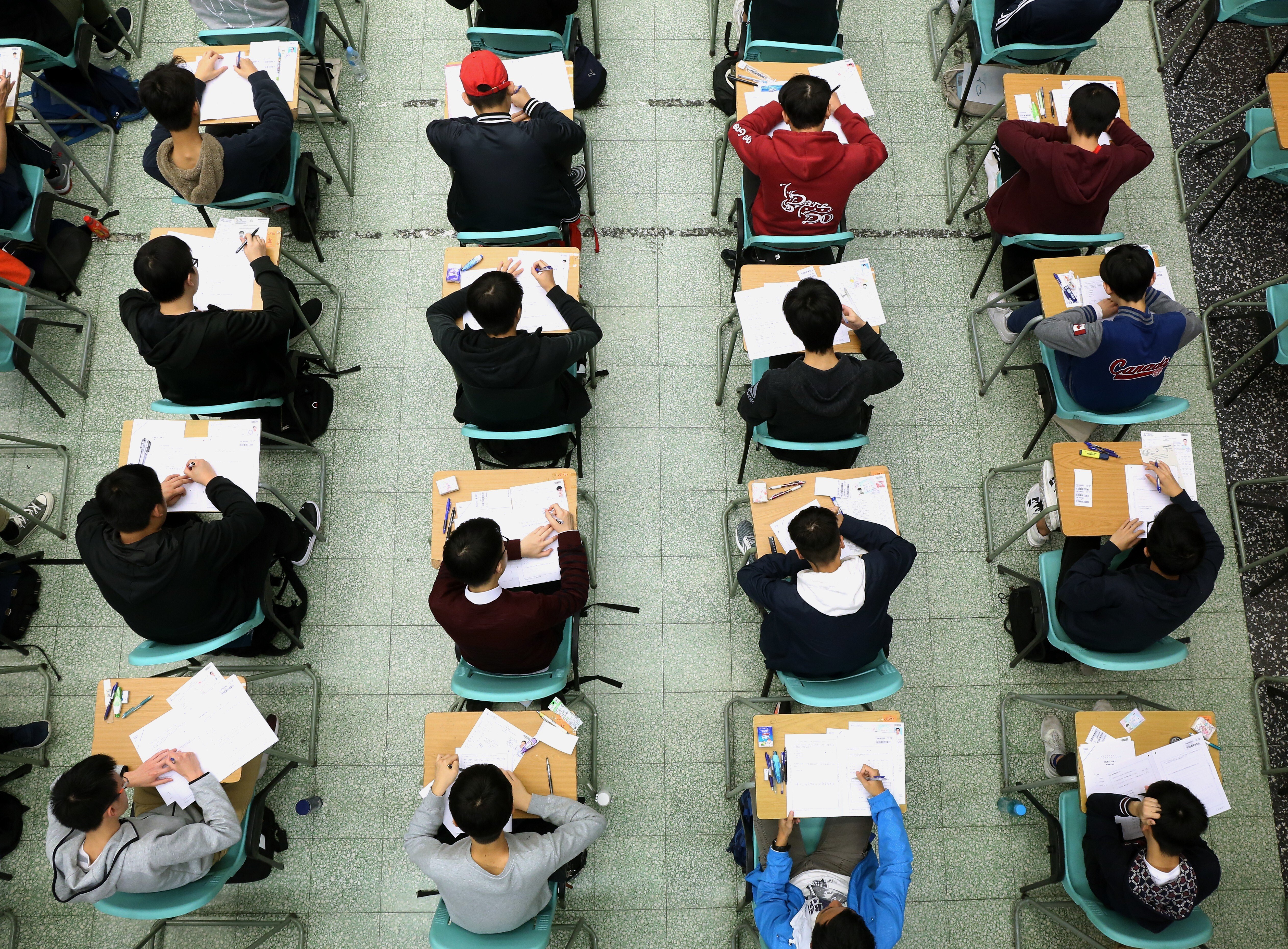 Hong Kong students on the first day of the Diploma of Secondary Education exams at the Cheung Sha Wan Catholic Secondary School last year. Exams in Hong Kong could be cancelled this year if there is a surge in coronavirus cases. Photo: SCMP