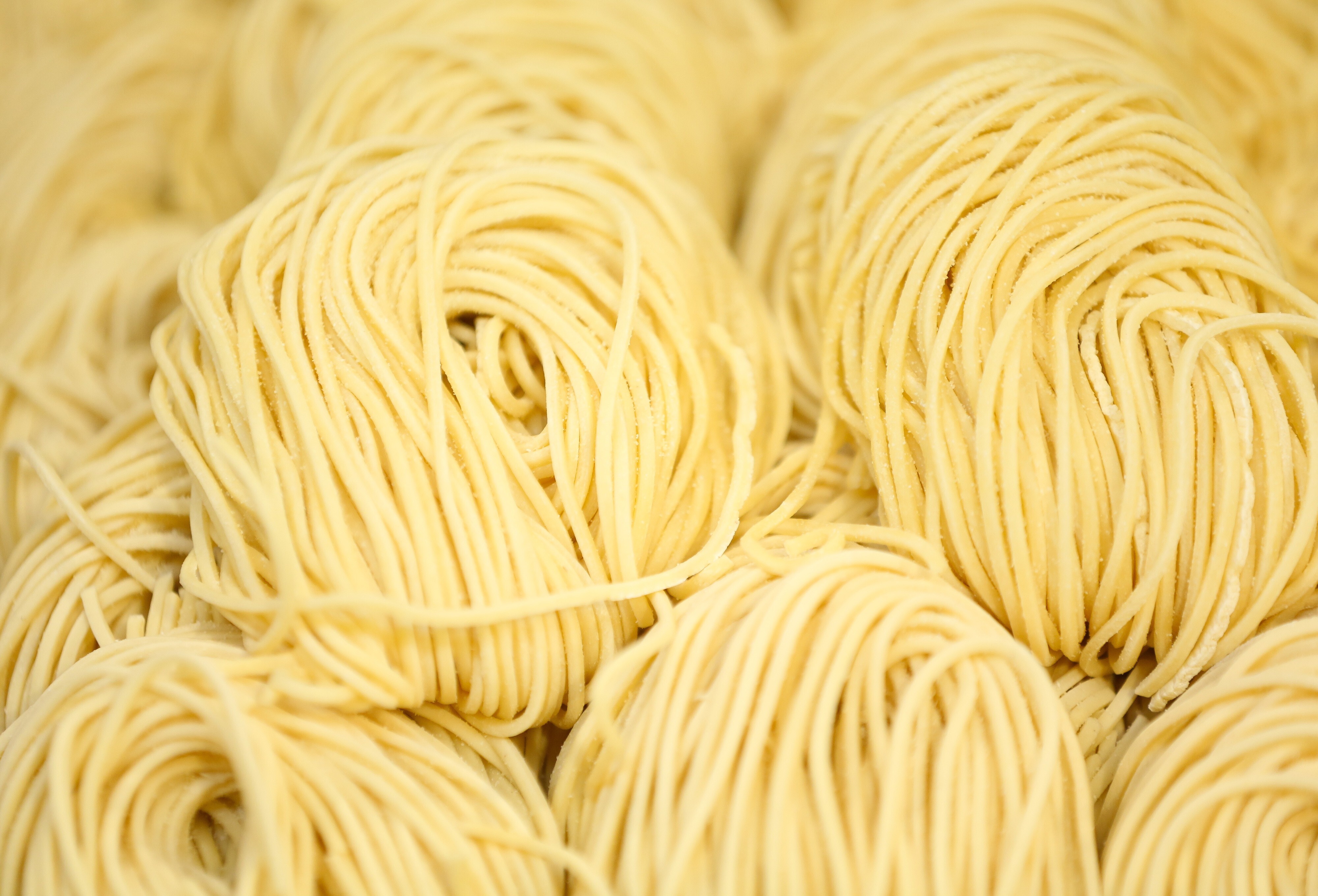 Bundles of fresh handmade pasta. Photo: Bloomberg