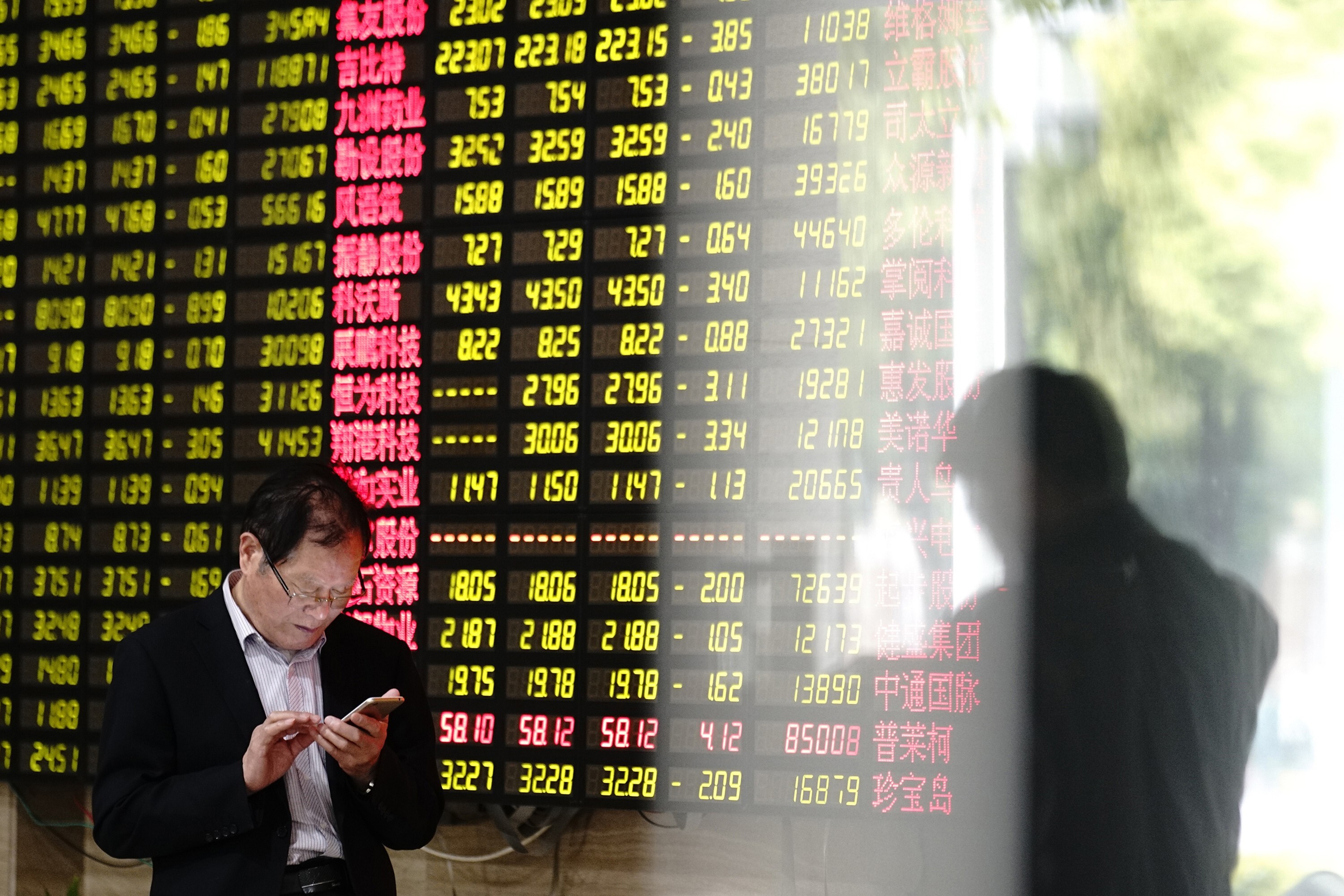 China’s Shanghai Composite Index is the third best performer this month among Asia’s major benchmarks after South Korea’s Kospi and Taiwan’s Taiex. Photo: AP Photo
