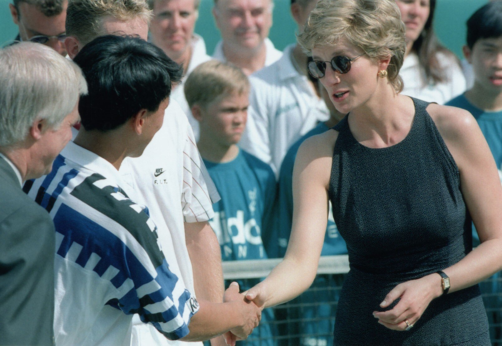 Princess Diana shakes hands with Michael Chang after he won the Salem Hong Kong Open tennis tournament in April 1995. Photo: SCMP