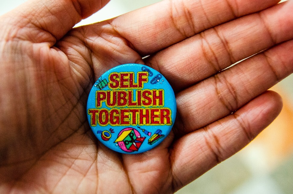 A badge by Makó Micro-Press encouraging women in the Philippines to self-publish their stories. Photo: Maro Enriquez