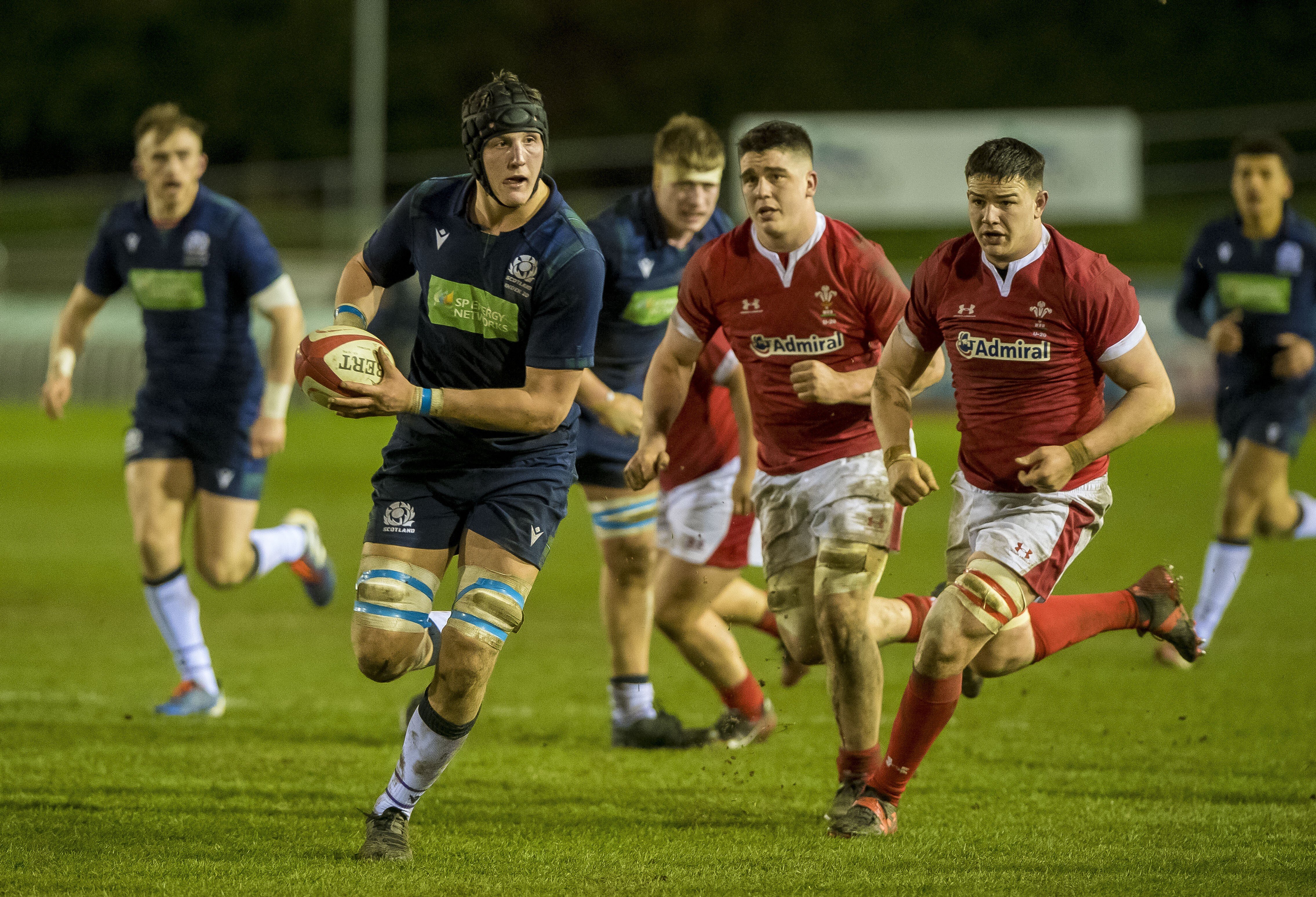 Scotland's Cameron Henderson takes the ball in a record-breaking match against Wales this year. Photo: Craig Watson