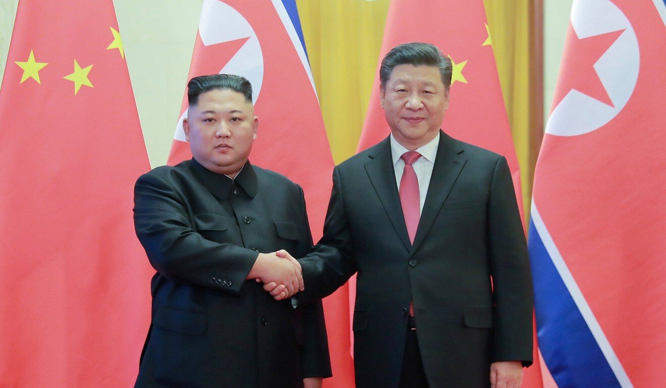 Kim pictured with Chinese President Xi Jinping during his visit to Beijing in January last year. Photo: Reuters