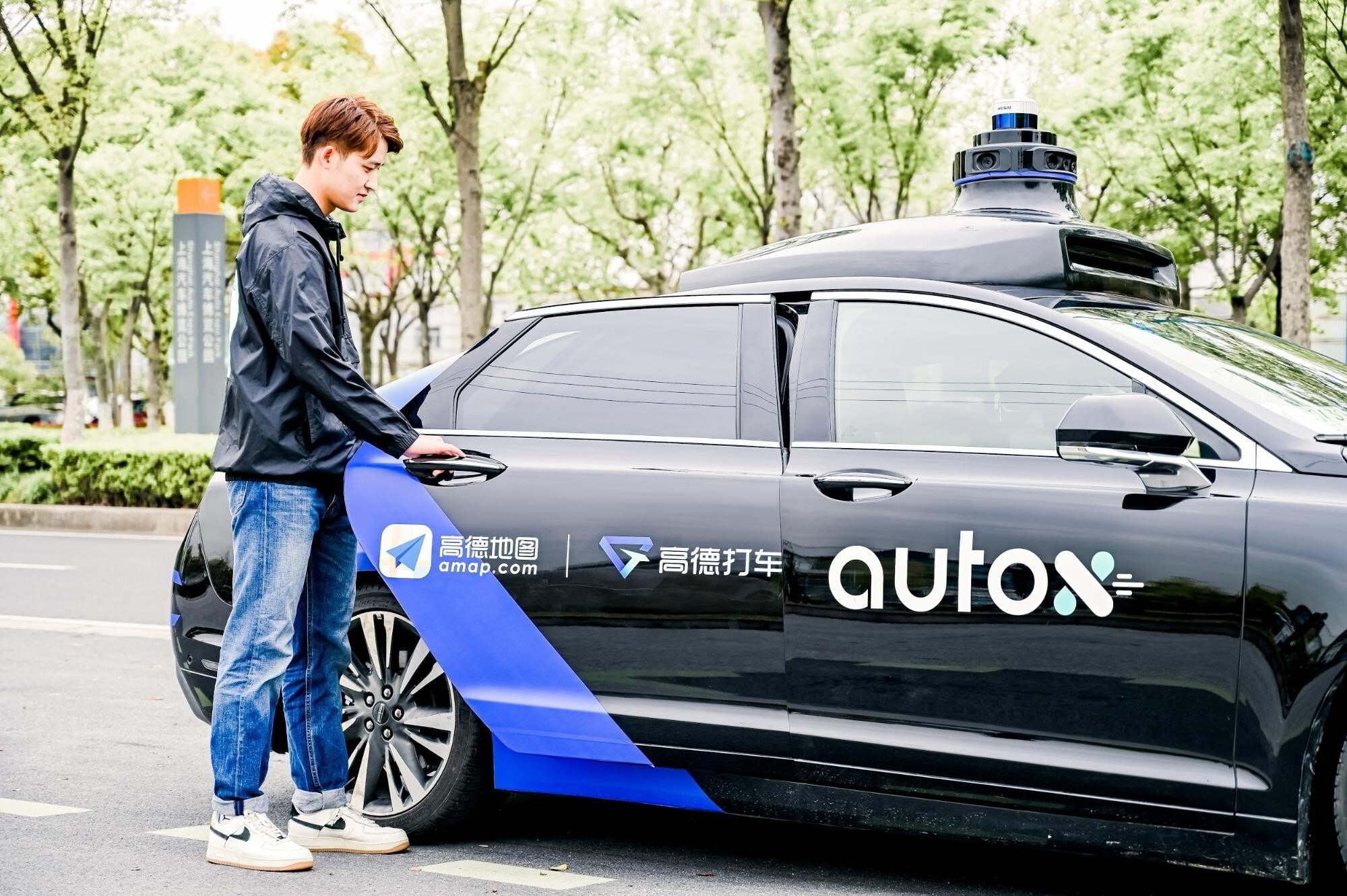 The AutoX RoboTaxi service in Shanghai’s Jiading district marks the first time an option for a self-driving car has become available on a major ride-hailing platform in China. Photo: Handout