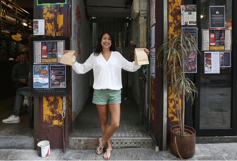 Restaurateur TM Chan outside her restaurant Pete’s Place on High Street in Sai Ying Pun. Photo: Jonathan Wong