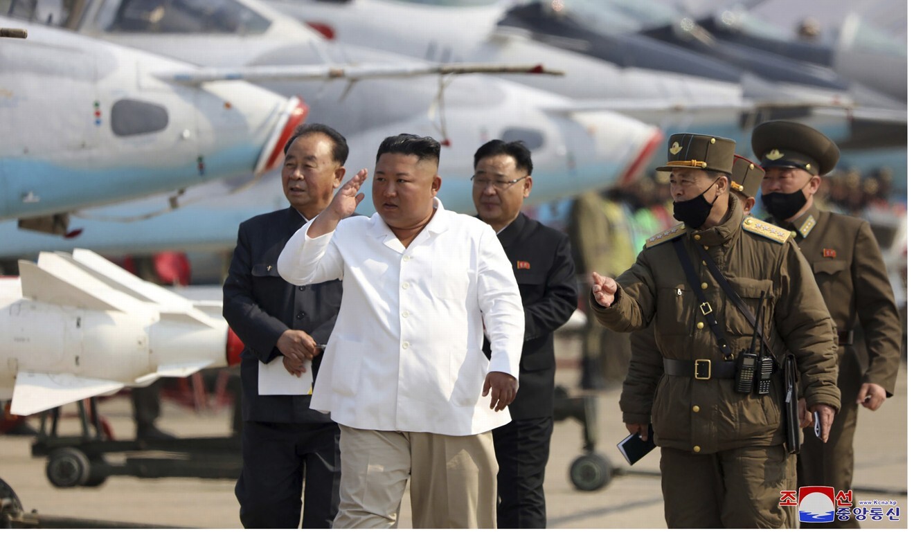North Korean leader Kim Jong-un inspects an air defence unit in western area. Photo: AP