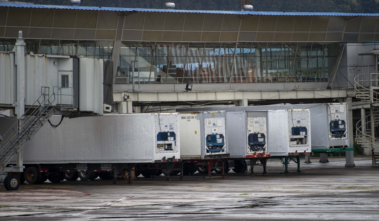 Refrigeration trucks for bodies in Quito, Ecuador. Photo: AFP