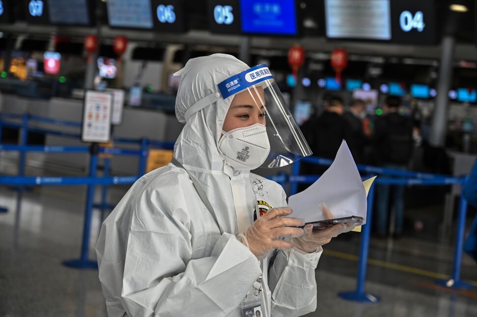 A security worker at Shanghai airport on March 18. Photo: AFP