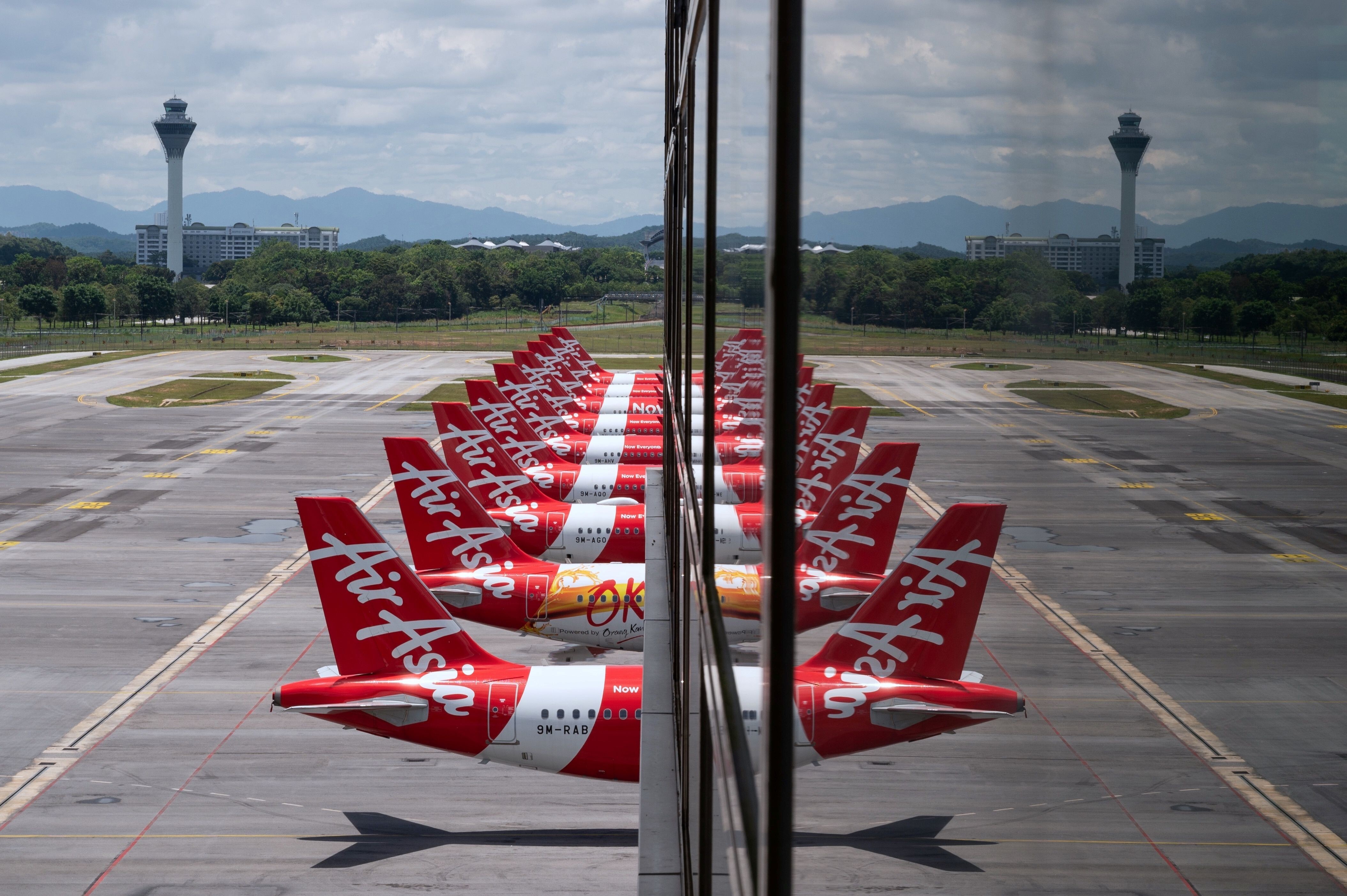Grounded aeroplanes in Malaysia. Covid-19 has impacted travel around the world, but as Kishore Mahbubabi writes, the genie of globalisation cannot be put back in the bottle. Photo: AFP