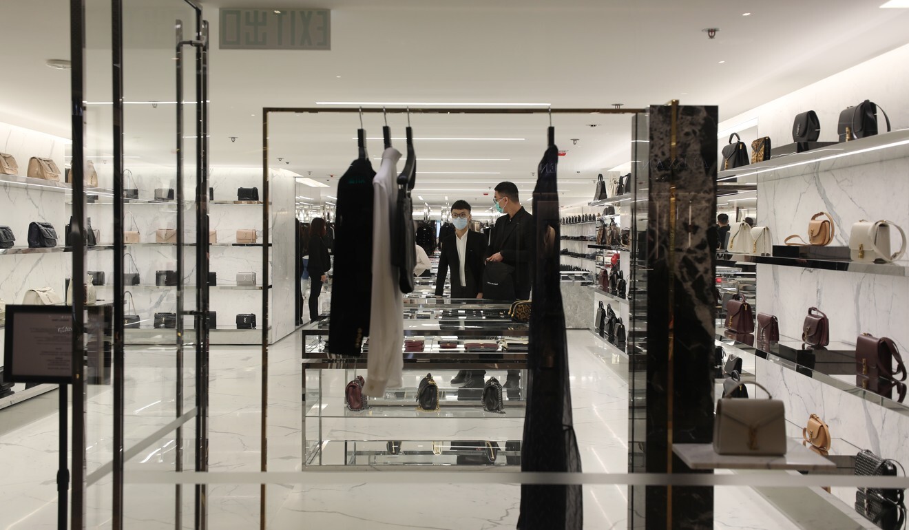 A luxury brand retailer stands empty in Hong Kong’s popular Tsim Sha Tsui shopping district amid what would typically be a busy time of year. Photo: Xiaomei Chen