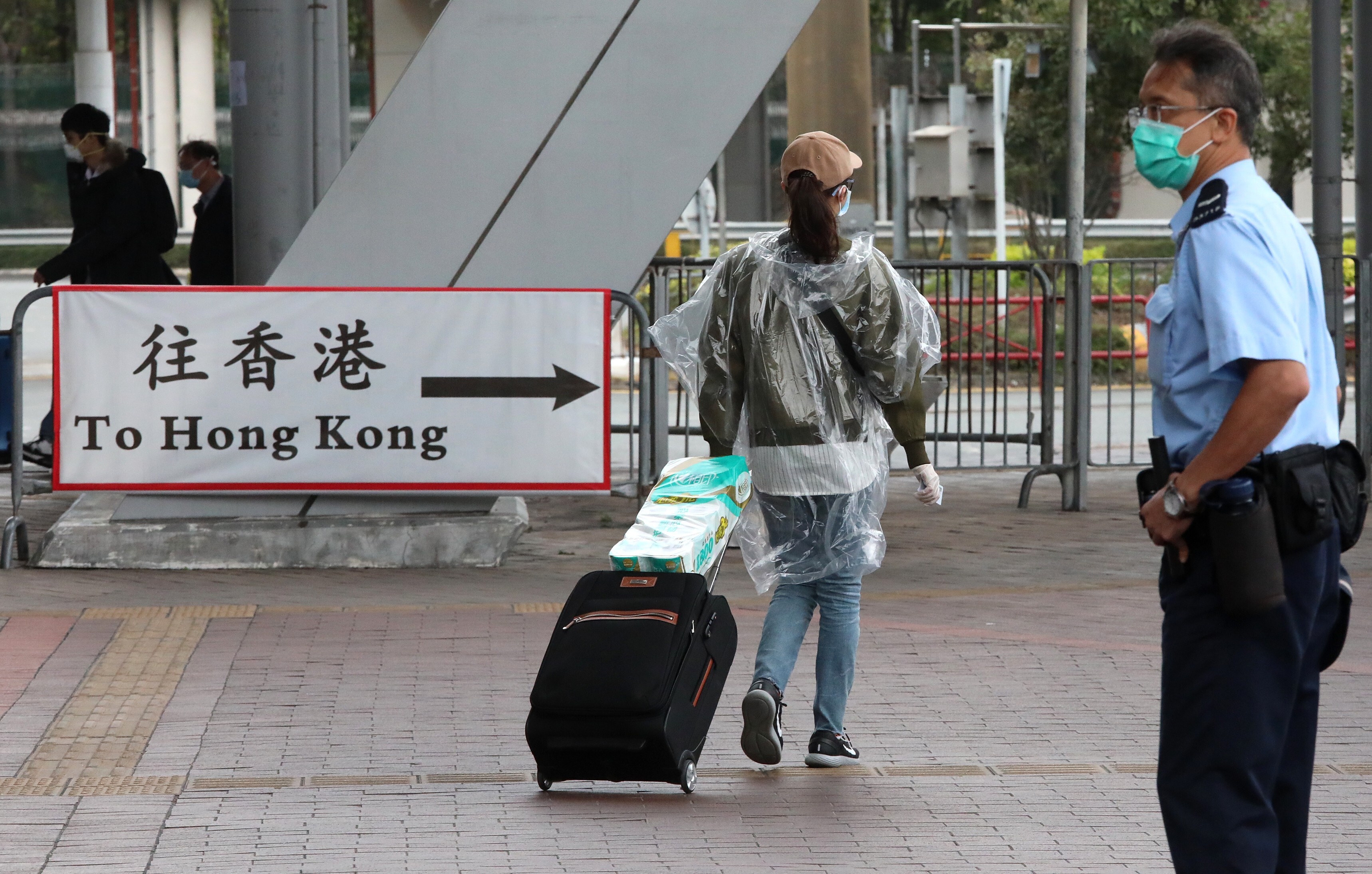A traveller arrives in Hong Kong via the Shenzhen Bay checkpoint. Photo: Felix Wong