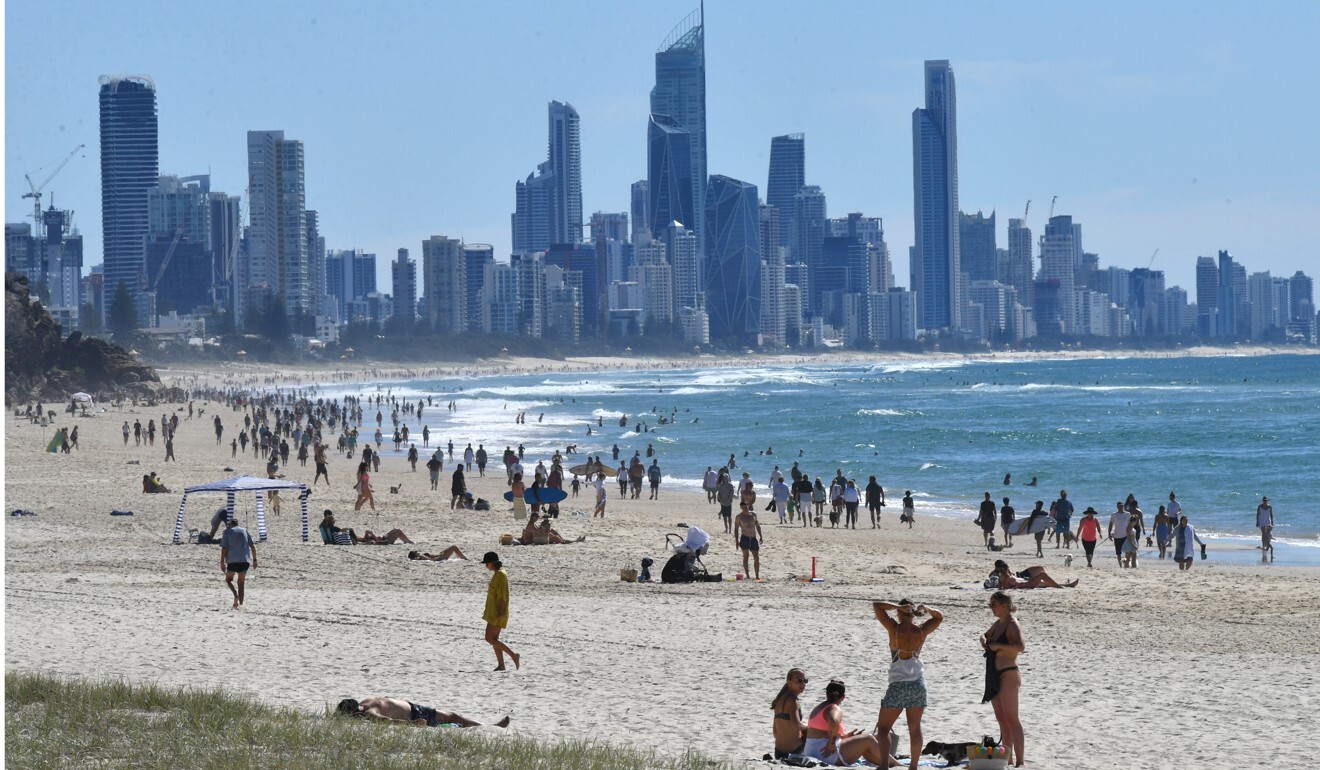 People on the beach at Burleigh Heads on the Gold Coast, Queensland, on May 3, after the Australian government relaxed some restrictions. Photo: EPA-EFE