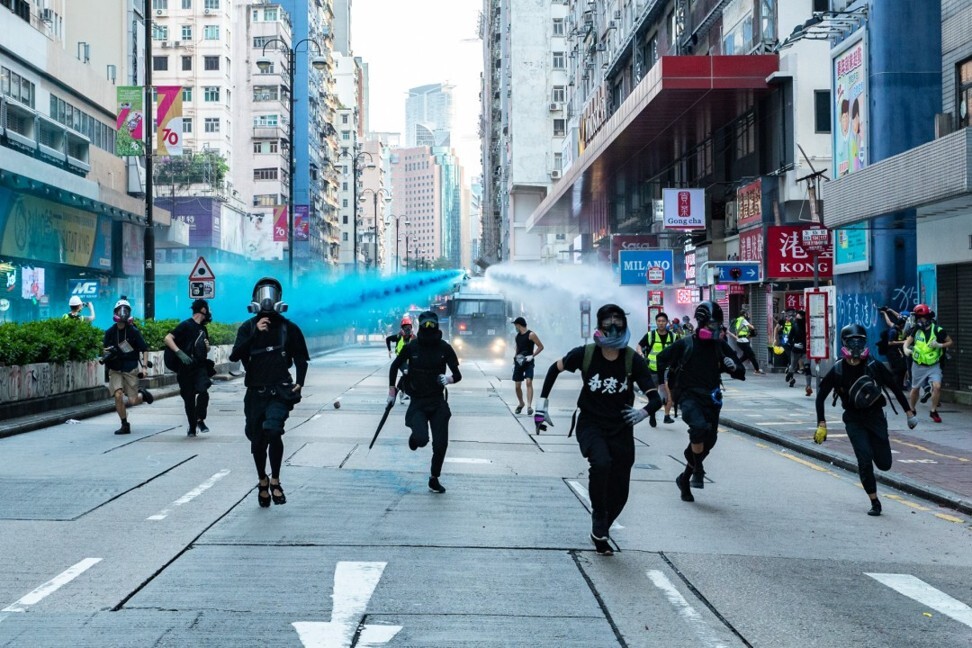 In front of the Water Cannon: Hong Kong People, by Kenji Wong. Photo: courtesy of Hong Kong Human Rights Arts Prize 2020 / Kenji Wong