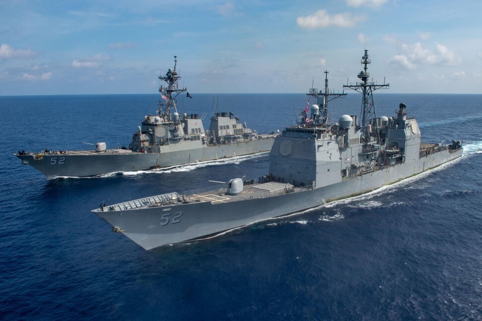 The US Navy Ticonderoga-class guided missile cruiser USS Bunker Hill, front, and Arleigh-Burke class guided-missile destroyer USS Barry in the South China Sea on April 18. Photo: US Navy