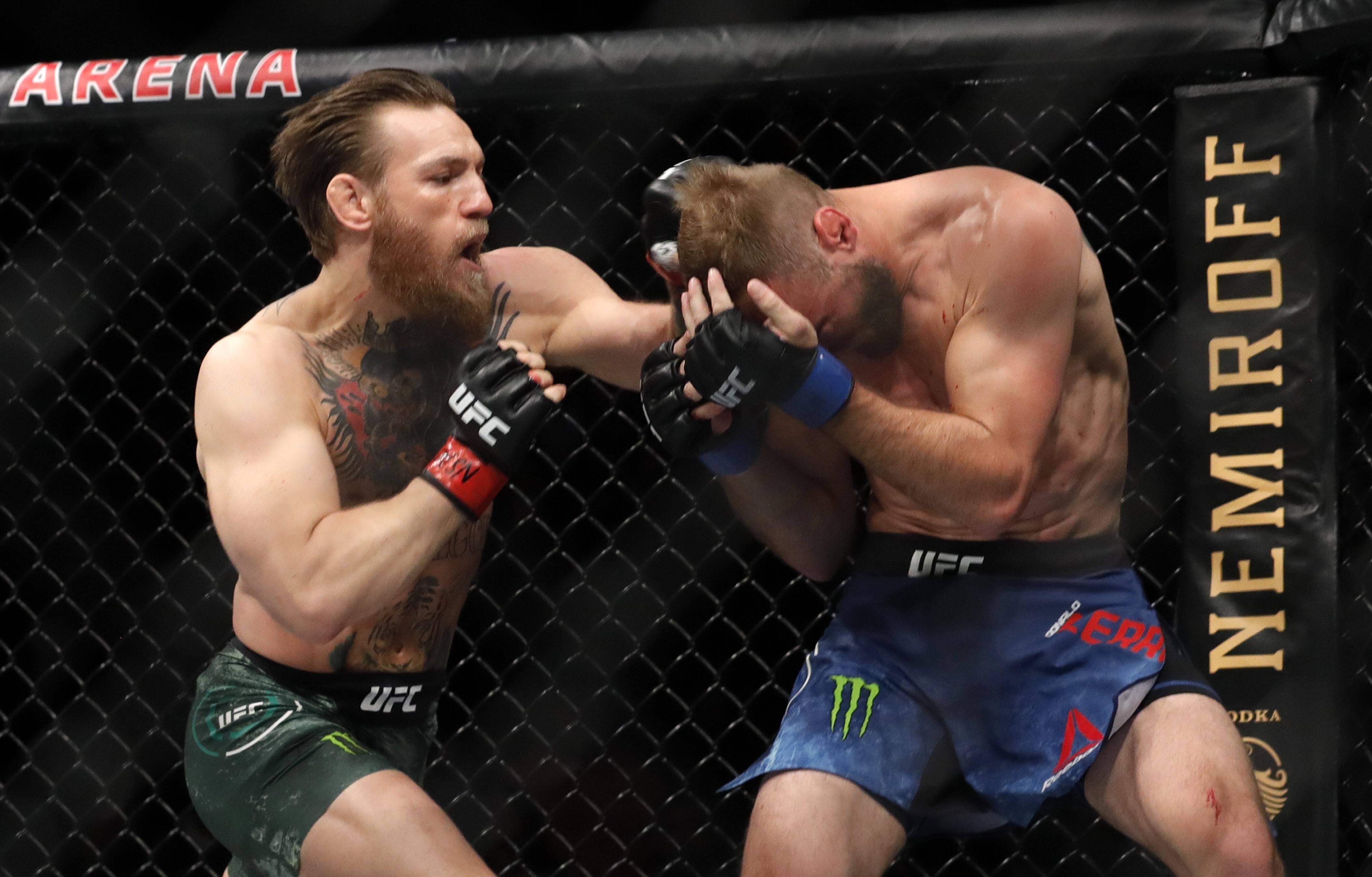 Conor McGregor punches Donald Cerrone in their welterweight bout at UFC 246 in January. Photo: AFP