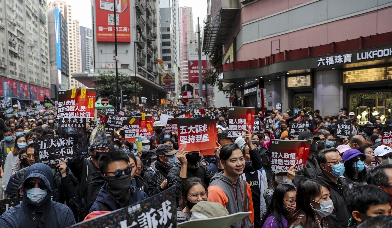 Protesters march from Victoria Park to Chater Road Pedestrian Precinct on January 1. Photo: Sam Tsang