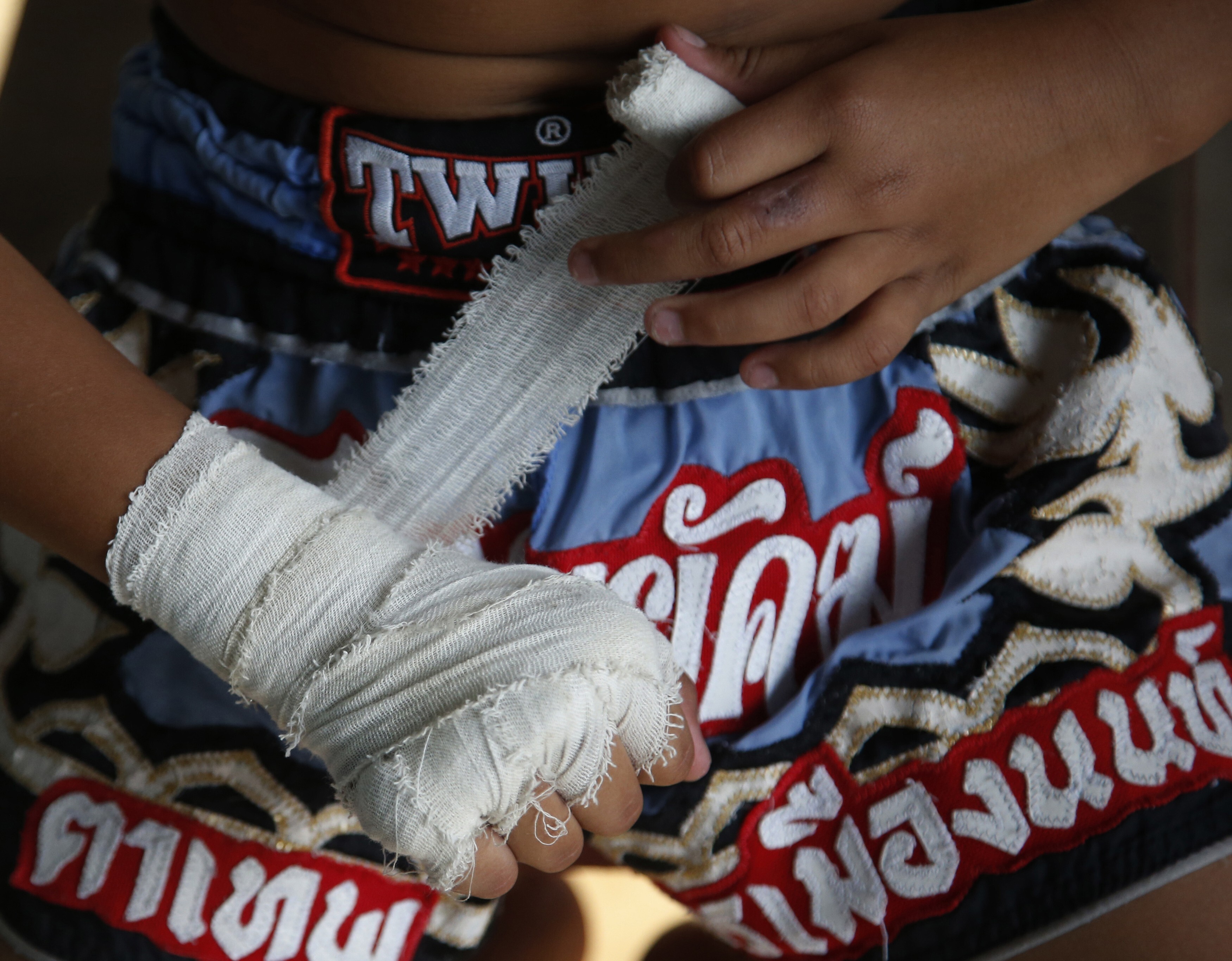 The event at Lumpinee stadium continued despite the government ordering the cancellation or postponement of all large gatherings. Photo: AP