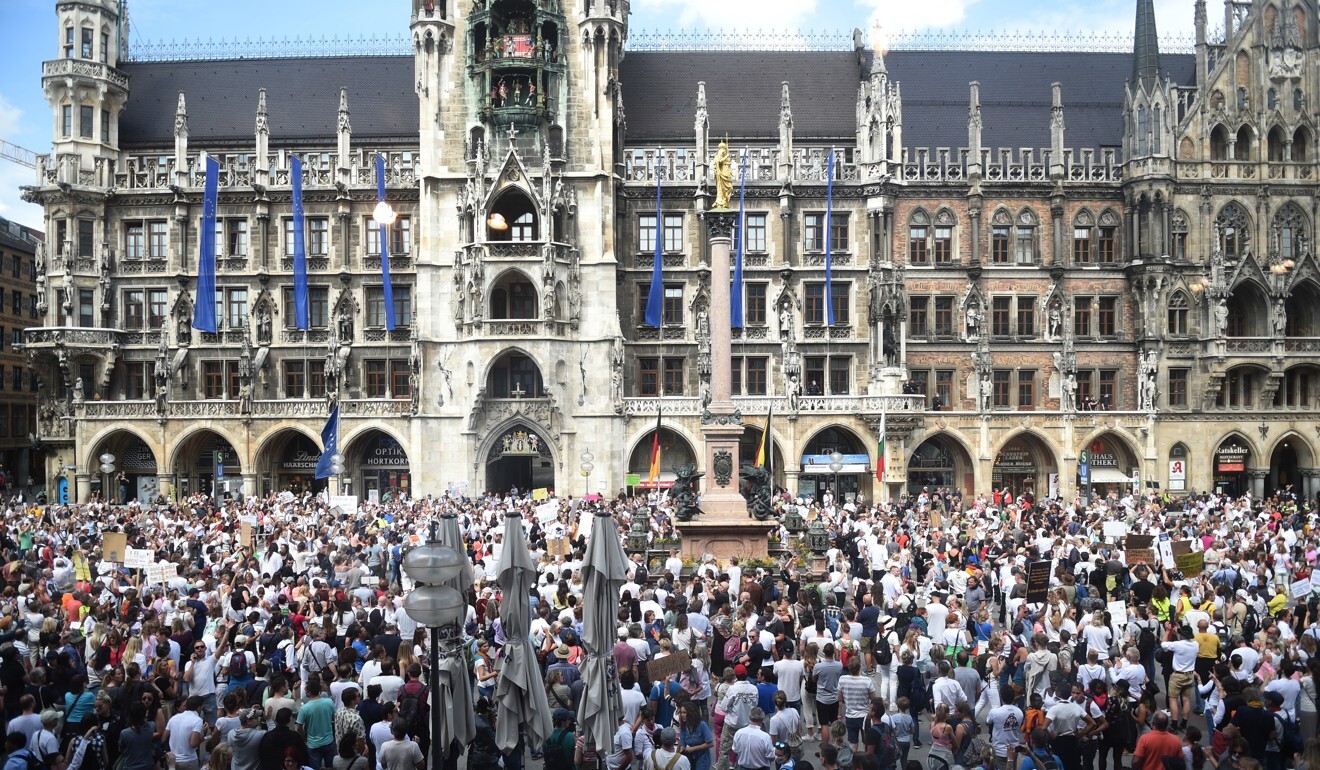 A crowd gathers in Munich on Saturday to protest against coronavirus lockdown restrictions. Photo: dpa