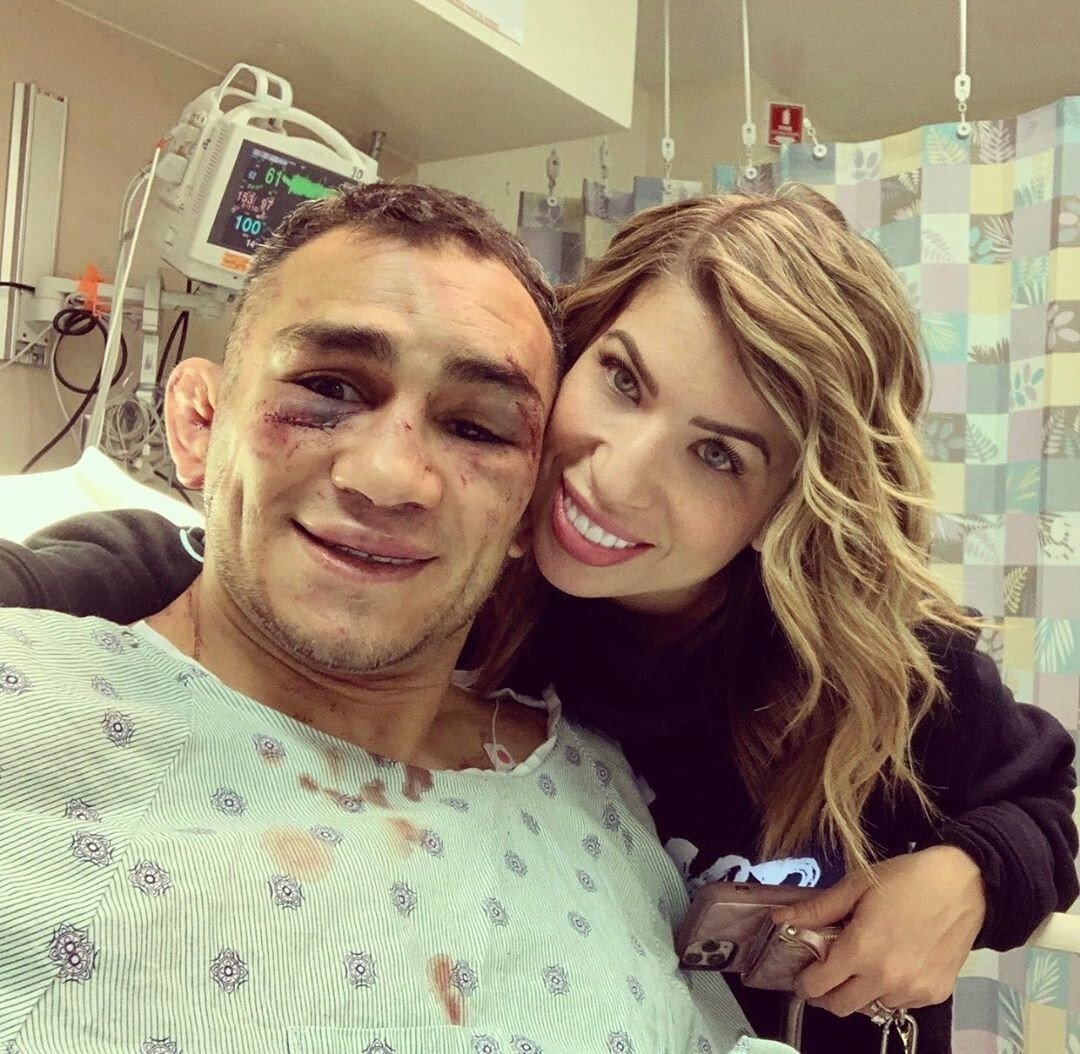 Tony Ferguson posts a selfie in his hospital bed with his wife, showing off his broken orbital bone. Photo: Instagram/@tonyfergusonxt