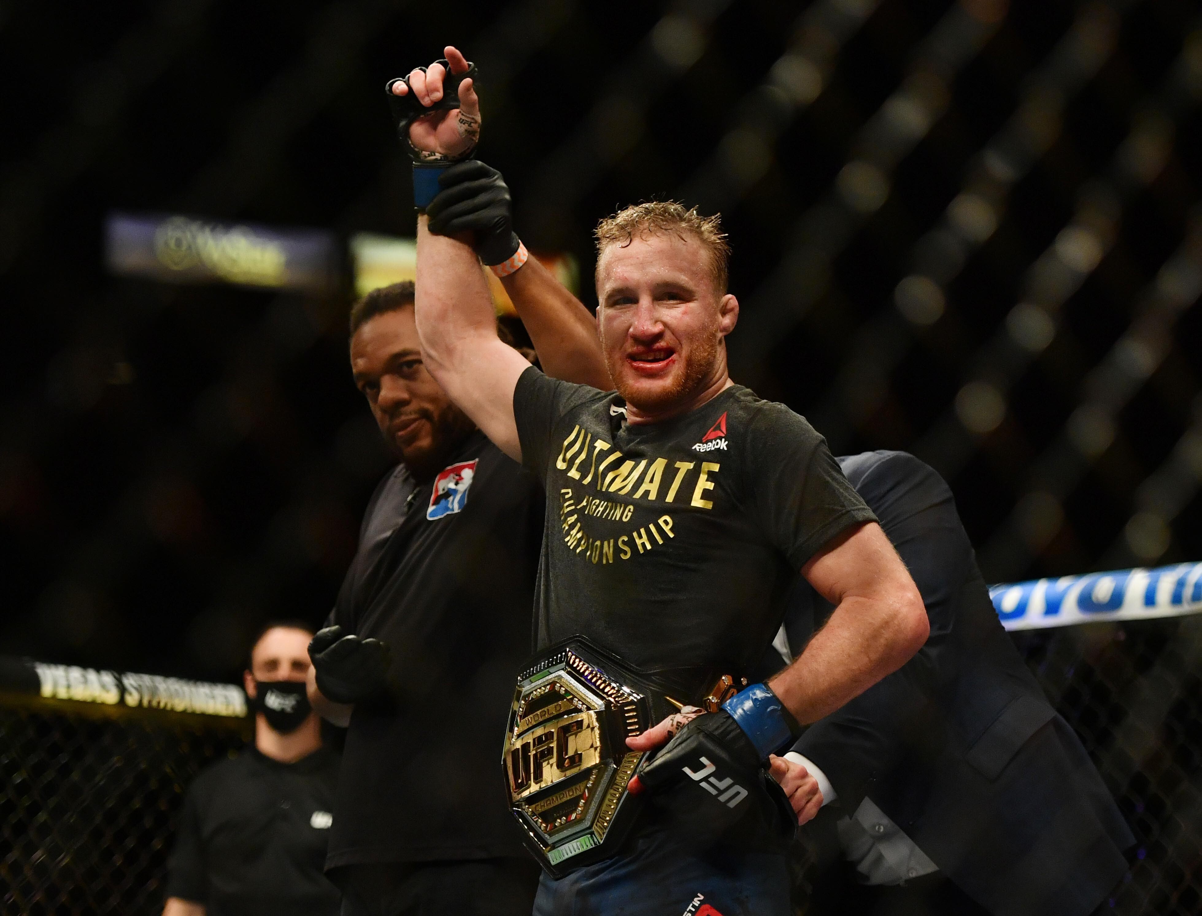 Dana White puts the interim lightweight belt on Justin Gaethje after his win against Tony Ferguson at UFC 249. Photo: USA TODAY Sports