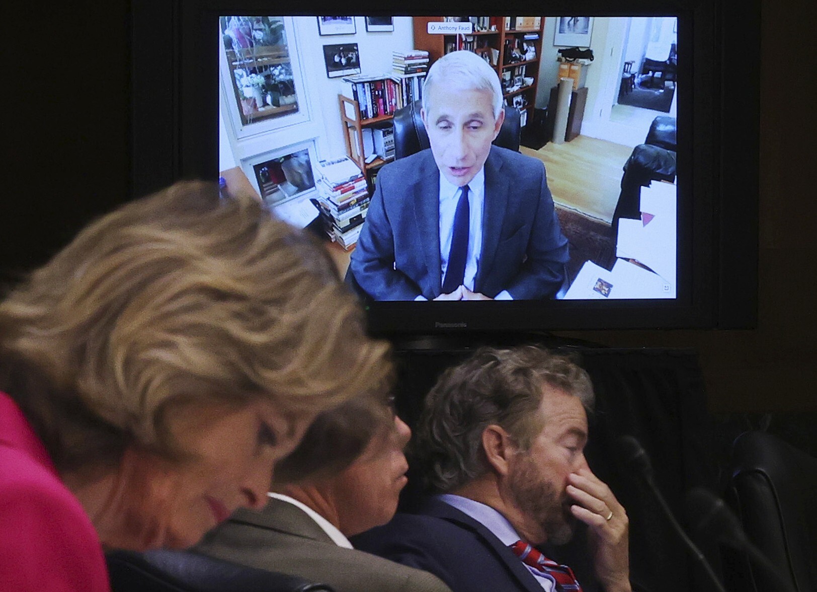 Senators listen as Dr Anthony Fauci speaks remotely during a virtual Senate committee hearing on Tuesday. Photo: AP
