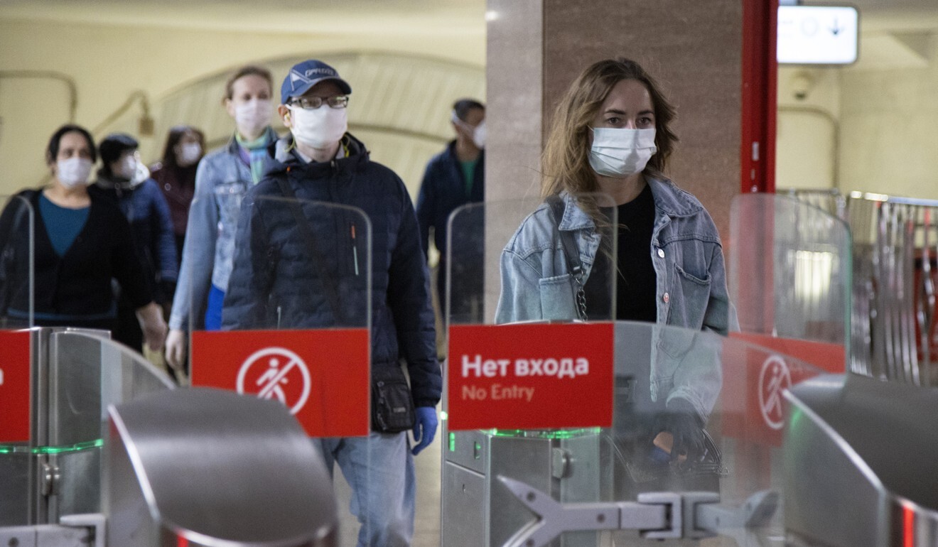 Commuters observe social distancing guidelines at a subway station in Moscow on May 12, 2020. Photo: AP