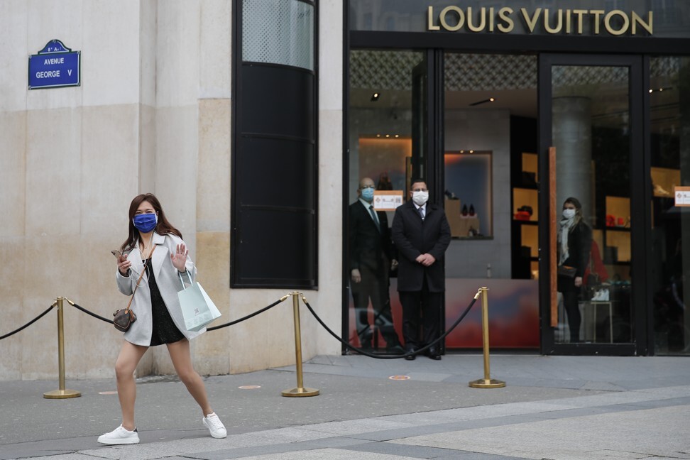 Luxury stores open in Paris that's empty of tourists as France