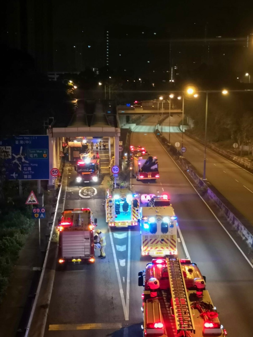 Emergency services attend the site of a crash on Cheung Pei Shan Road in Tsuen Wan in the early hours of Wednesday. Photo: Facebook