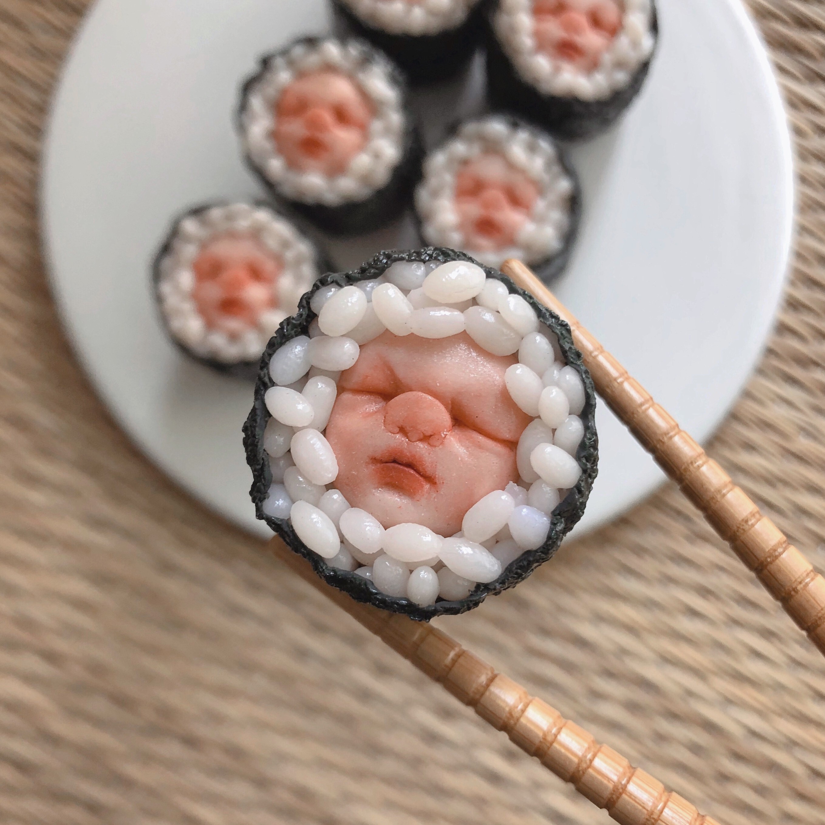 Sushi models featuring baby heads made of polymer clay by Singaporean artist Qixuan Lim. The sculptor’s works have won her hordes of Instagram fans. Photo: Courtesy of the artist