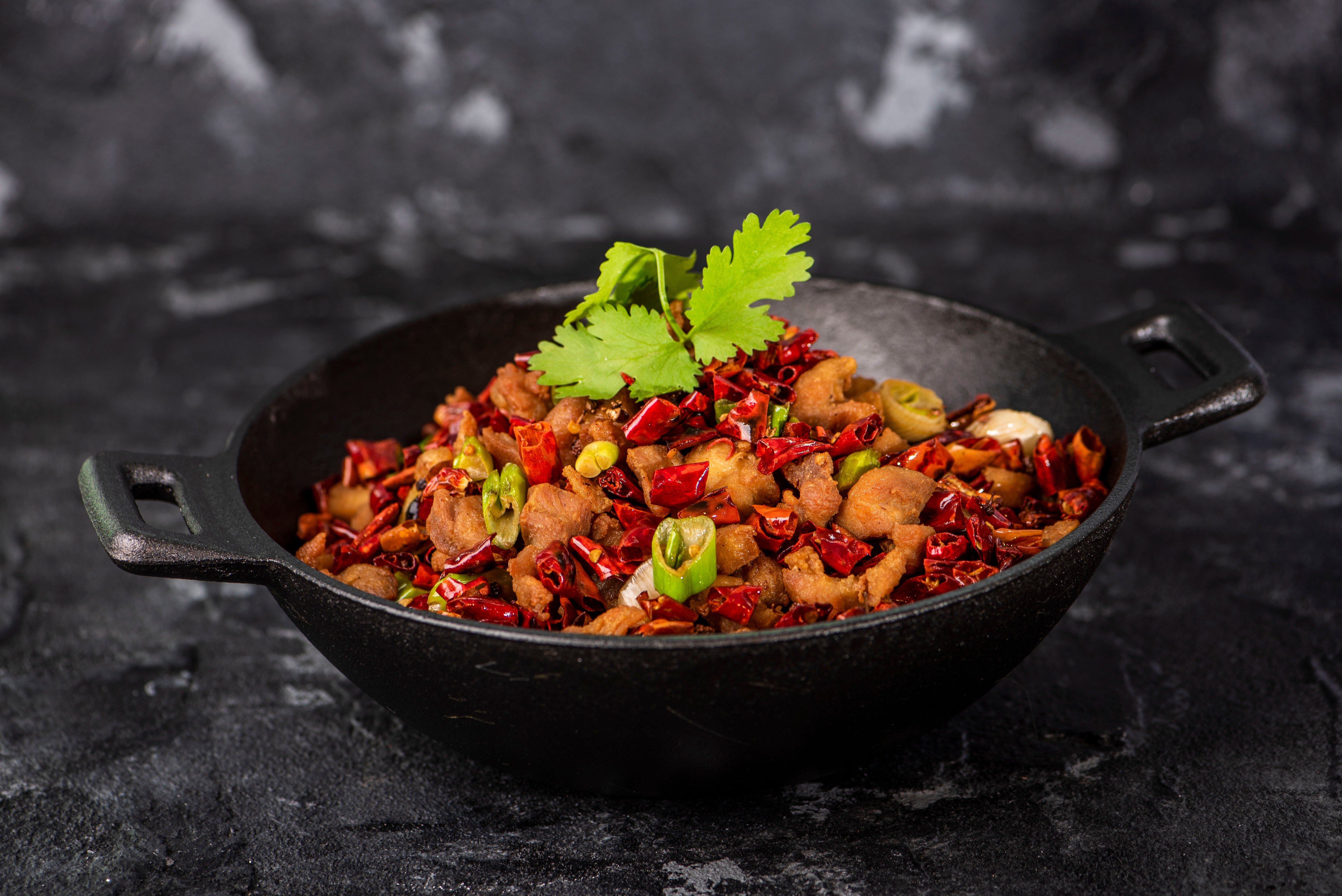 Chillies and mala pepper corns are staples of Sichuan food. Photo: Shutterstock