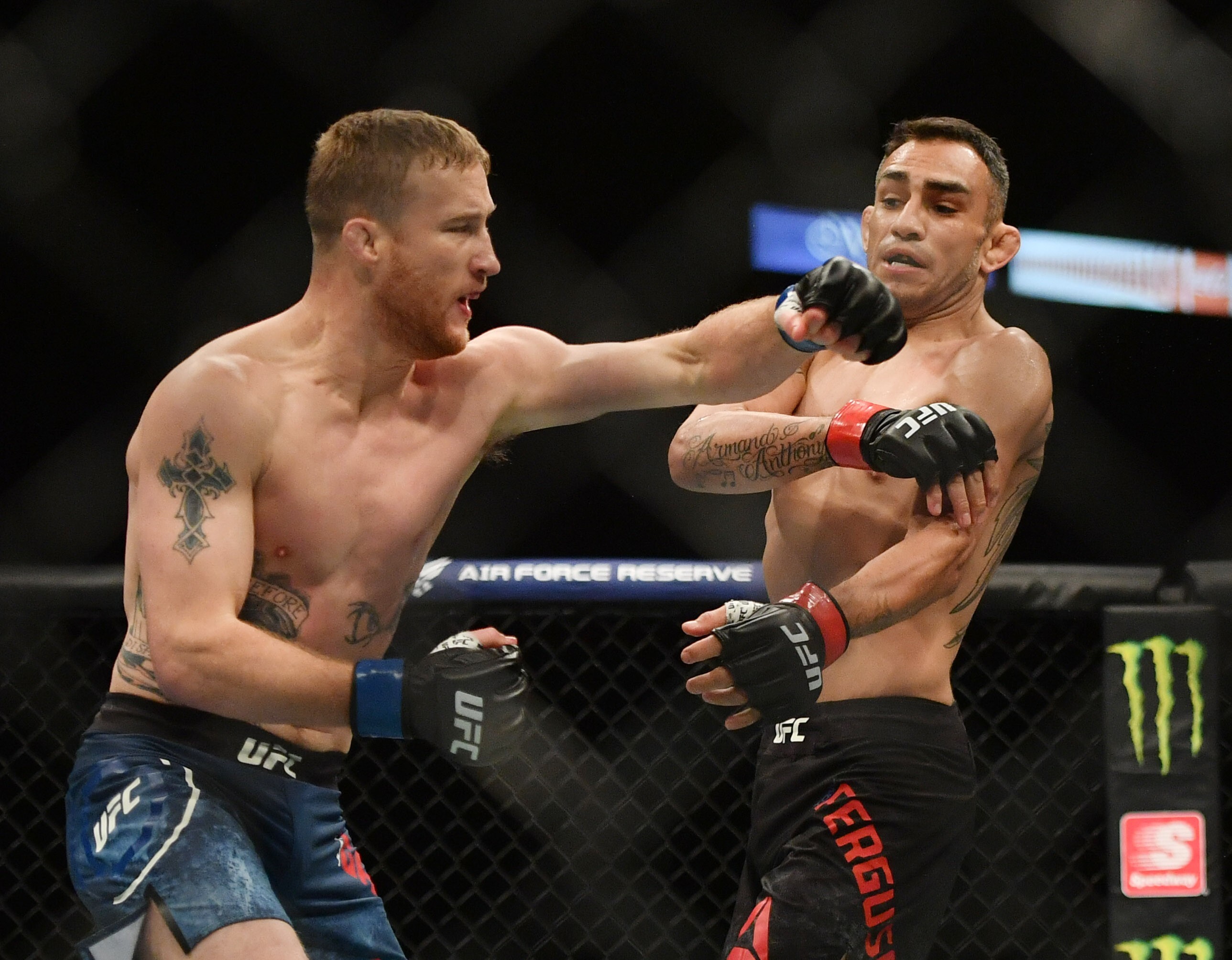 Justin Gaethje throws a left hook at Tony Ferguson. Photo: USA TODAY Sports