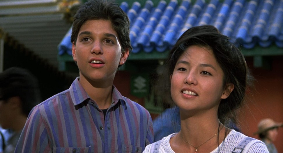 Tamlyn Tomita (right) and Ralph Macchio in a still from The Karate Kid Part II.