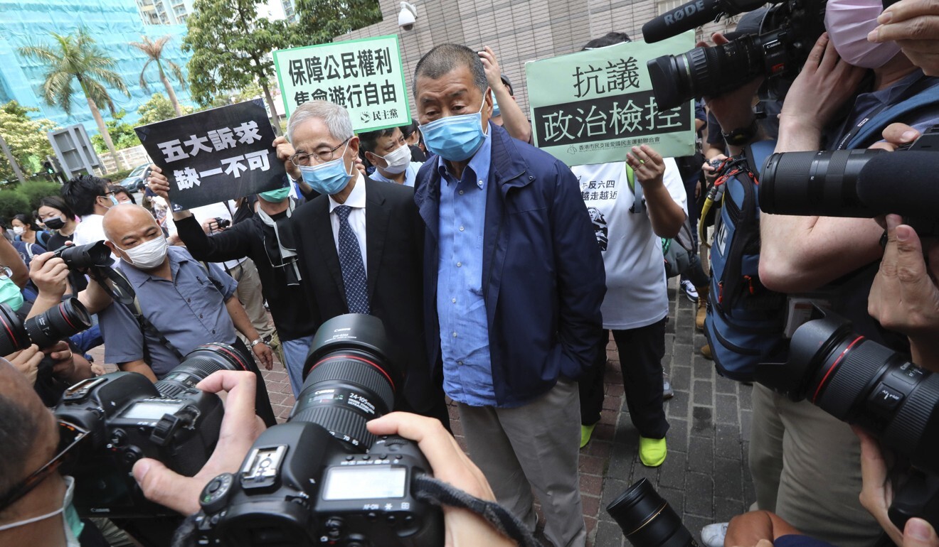 Former lawmaker Martin Lee (left) and Apple Daily founder Jimmy Lai are among those accused of colluding with foreign forces in the documentary. Photo: Felix Wong