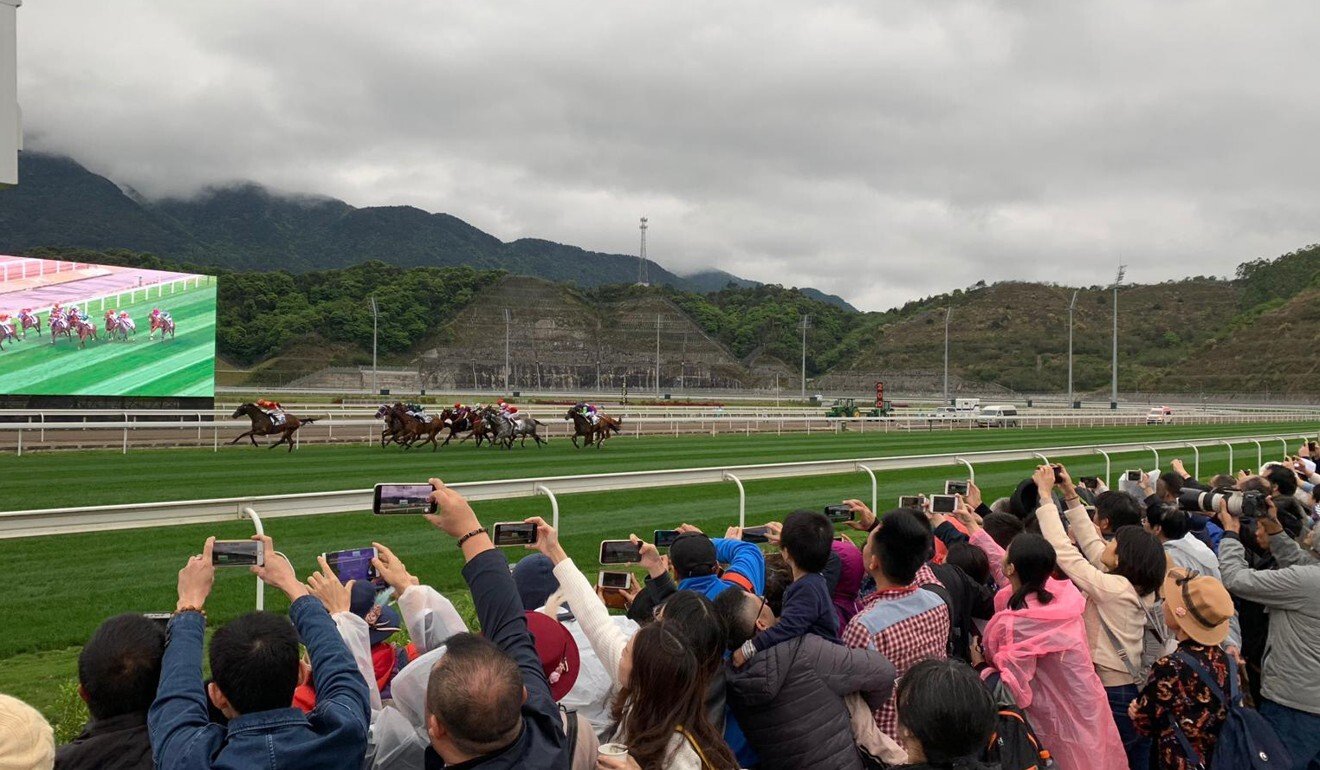 Fans soak up the action at the first meeting at Conghua Racecourse. Photo: Noel Prentice