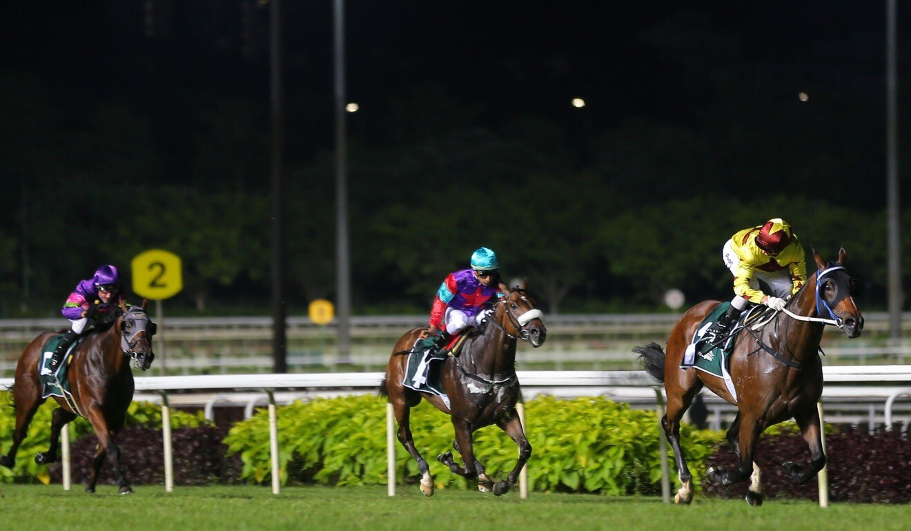 Southern Legend (right) races away with the 2019 Kranji Mile. Photo: Kenneth Chan
