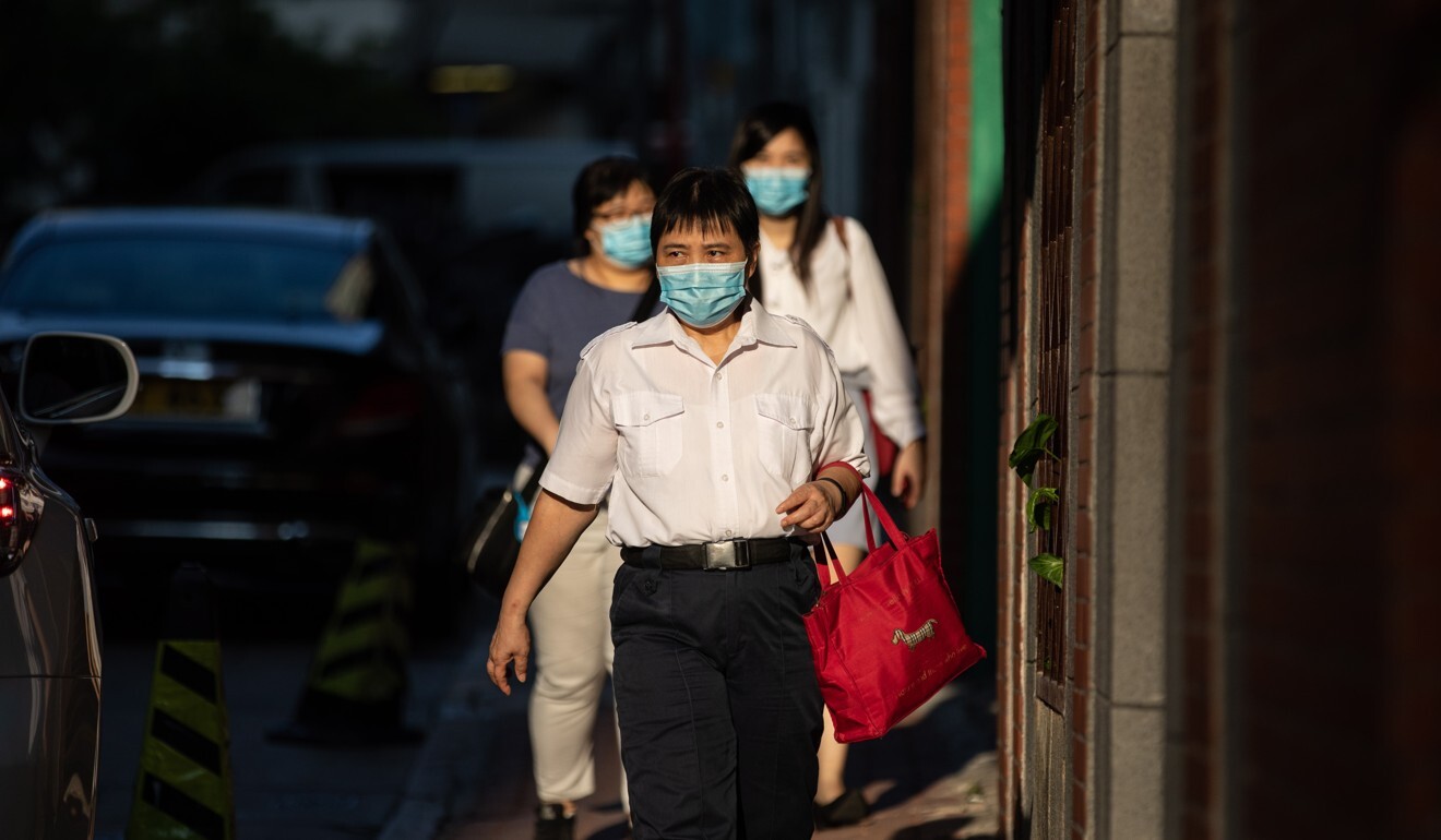 Pedestrians wearing masks in Hong Kong during the Covid-19 pandemic. Photo: EPA-EFE