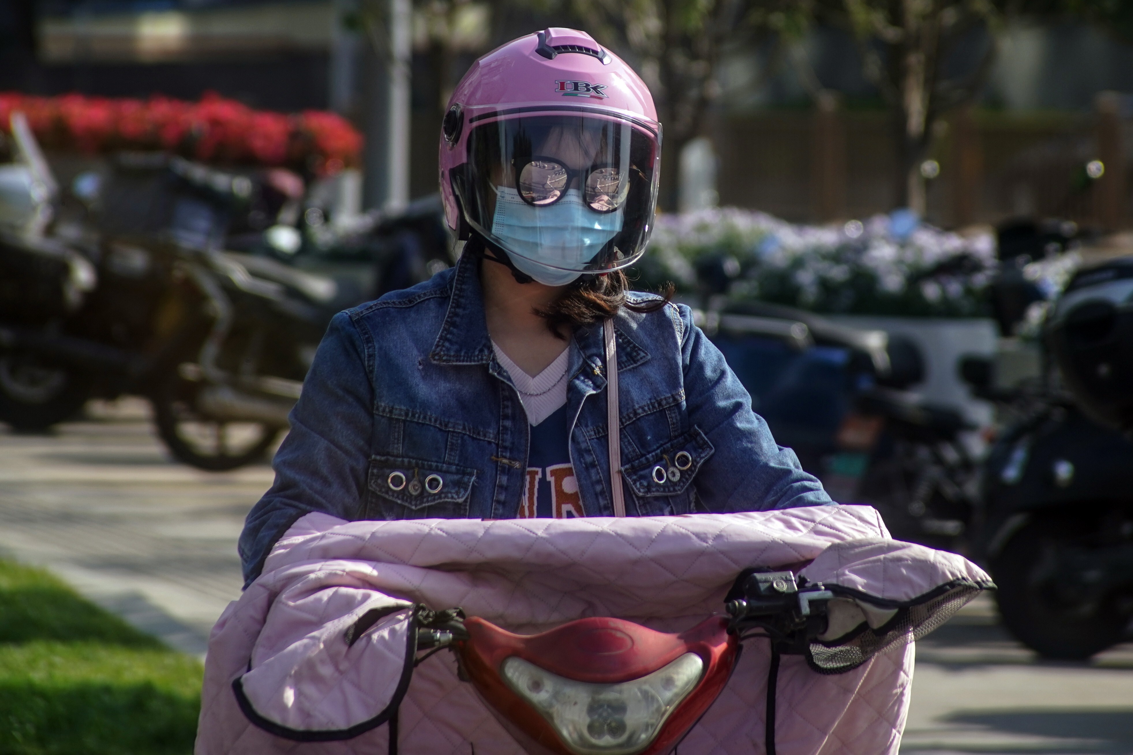Helmets will become mandatory for e-scooter riders in China from June 1. Photo: EPA