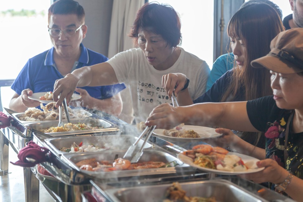 At buffets, guests share utensils to help themselves to food. Photo: Shutterstock
