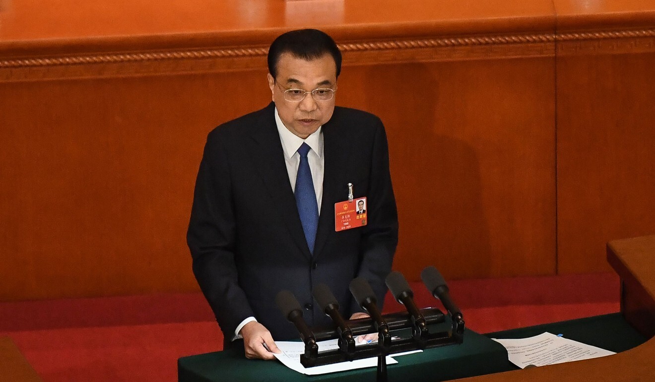 Chinese Premier Li Keqiang delivers his work report during the opening session of the National People's Congress on Friday. Photo: AFP