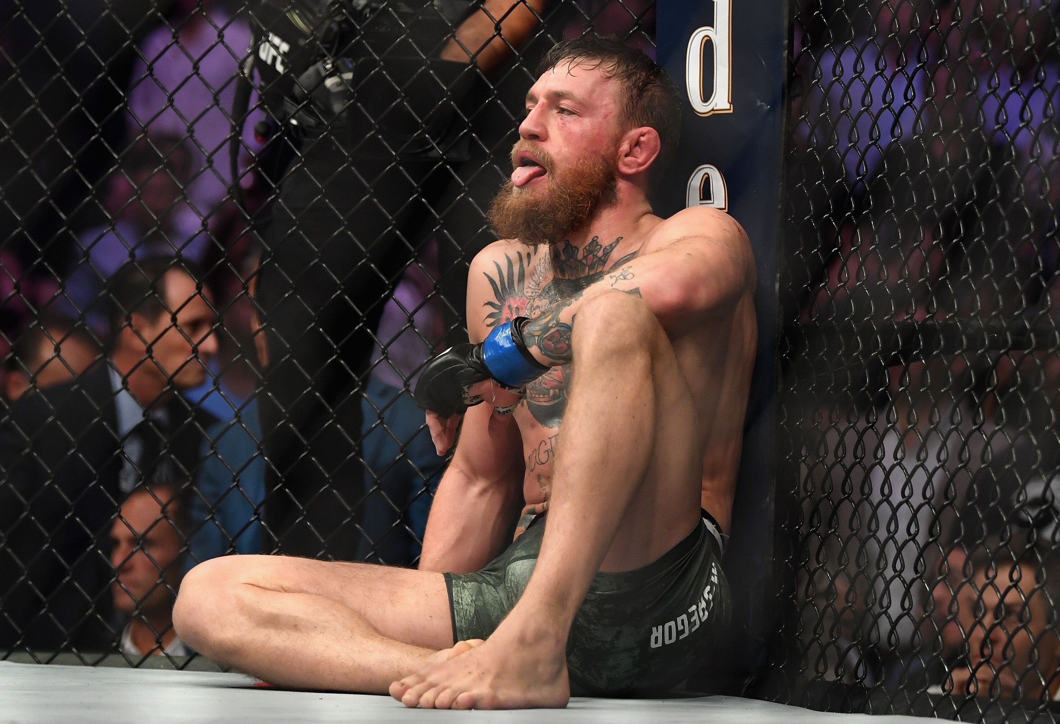 Conor McGregor sits in the octagon after being defeated by Khabib Nurmagomedov’s fourth-round submission in their UFC lightweight title fight at UFC 229 in the T-Mobile Arena, Las Vegas in 2018. Photo: AFP
