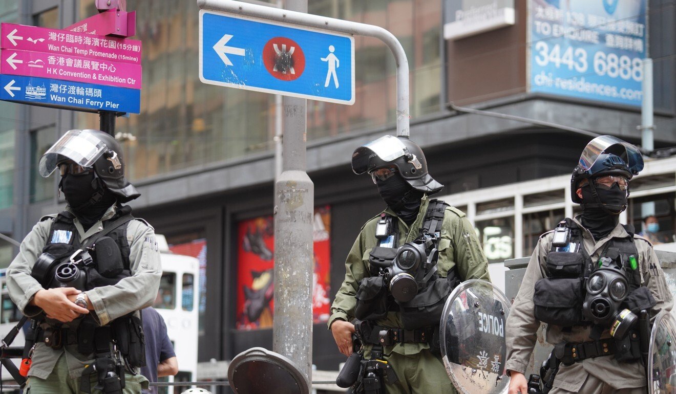 Hong Kong riot police make their presence felt in Wan Chai. Photo: Winson Wong