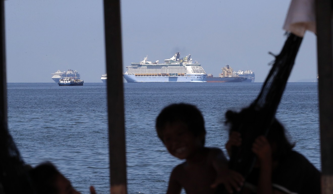 Thousands of repatriated Filipinos have been kept in quarantine on cruise ships anchored in Manila Bay. Photo: EPA