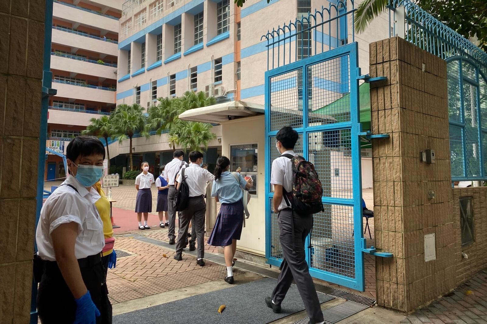 Students return to the Chinese Foundation Secondary School after online learning since Lunar New Year.