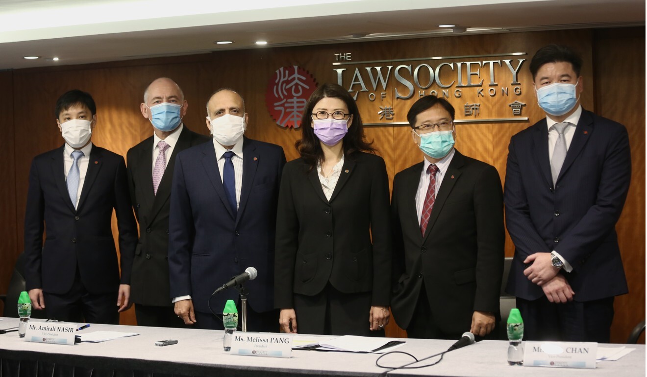 (From left) Law Society officials Pierre Chan, Brian Gilchrist, Amirali Nasir, Melissa Kaye Pang, Chan Chak-Ming and Roden Tong meet the press. Photo: Jonathan Wong