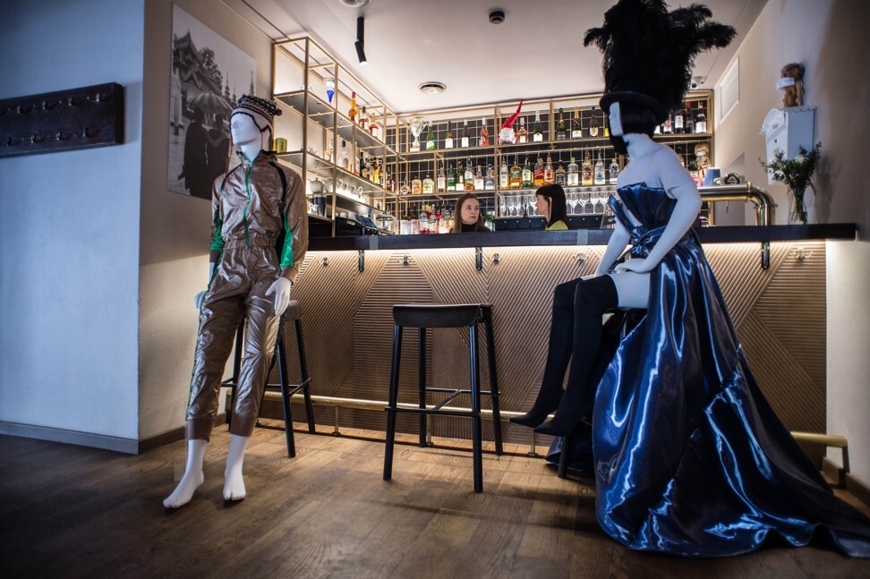 Under lockdown regulations, restaurants can serve every second table but that created a feeling of emptiness, which is why mannequins are now being used to fill up space. Photo: Xinhua