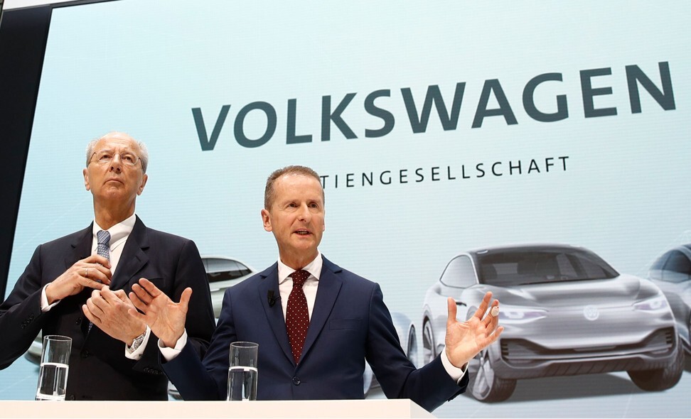 Volkswagen chief executive Herbert Diess, right, stands next to supervisory board chairman Hans Dieter Poetsch during a press conference at the company's headquarters in Wolfsburg, Germany, in April of 2018. Photo: Agence France-Presse